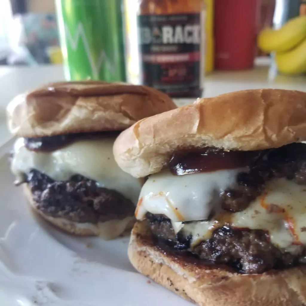 Homemade cheeseburgers with butter buns.